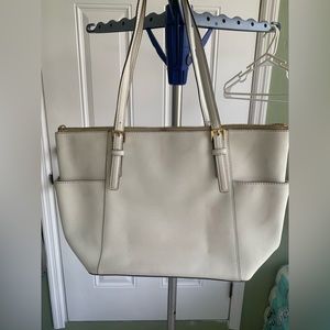 Michael Kors white leather handbag.